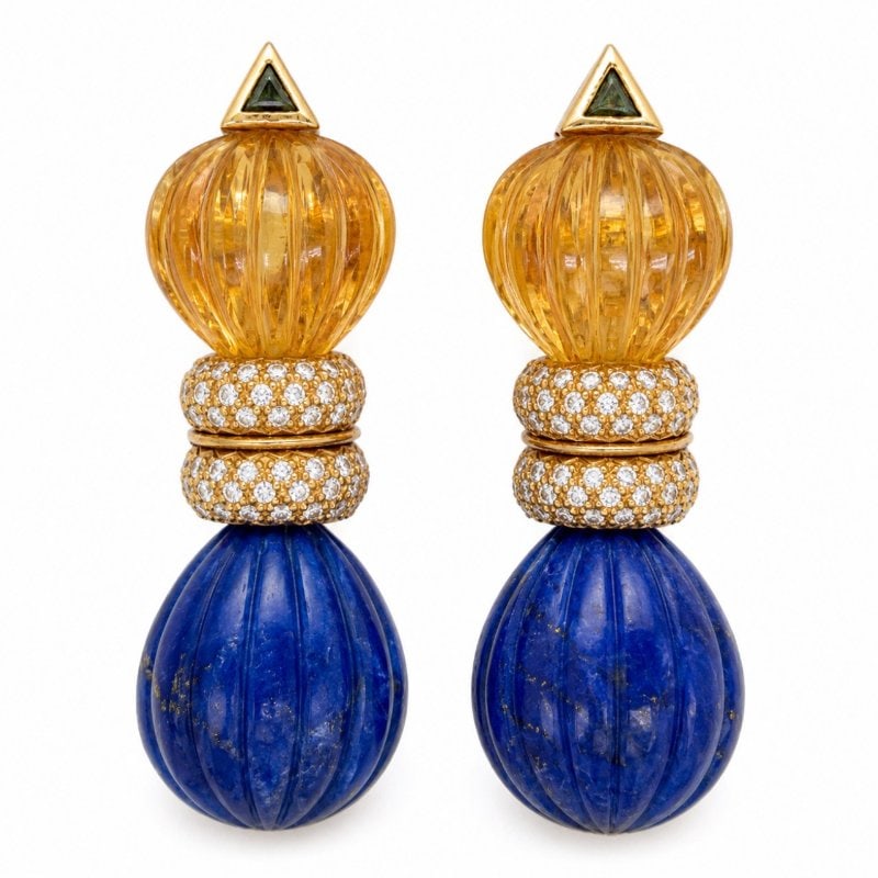 18K Yellow Gold Lapis Lazuli, Topaz, and Diamond Earrings: 18K Yellow Gold Lapis Lazuli, Topaz, and Diamond Earrings Weighing 30.3 gramsSet with 92 Diamonds weighing app. 1.00 Ct. G-I Color, VS1-SI1 ClarityAlong with carved Yellow Topaz & carved Lapis Lazuli2