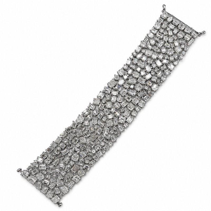 Platinum & 18K White Gold 122.40 Ct. Diamond Bracelet: Platinum & 18K White Gold 122.40 Ct. Diamond Bracelet Weighing 131.2 gramsSet with 228 Diamonds weighing app. 122.40 Ct. F-I Color, VS1-SI2 Clarity7.5 x 1.5 inches