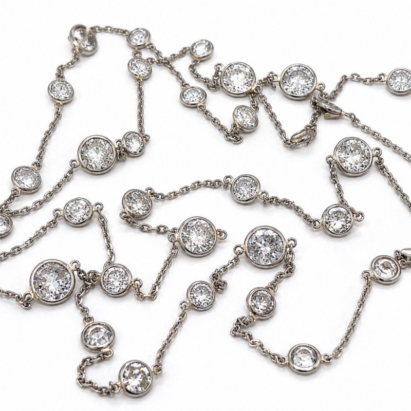 14K White Gold & Platinum 16.50 Ct. Diamond By The Yard Necklace: 14K White Gold & Platinum 16.50 Ct. Diamond By The Yard Necklace Weighing 11.3 gramsSet with 35 Diamonds weighing app. 16.50 Ct. F-I Color, SI2-I2 Clarity33 inches in length