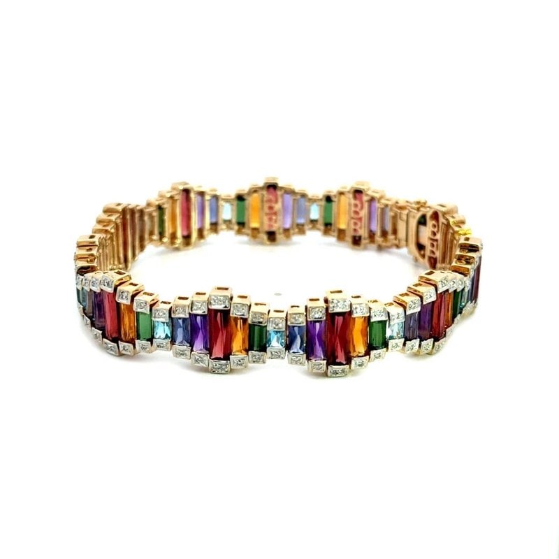 Bellari Ultimate Color Gold Bracelet 14k Yellow Channel Set Diamond Border: This stunning bracelet is from Bellari Ultimate Color Collection. Renowned for its rich use of custom-cut gemstones, this 14k yellow and white gold bracelet showcases the brand's distinctive artistic 