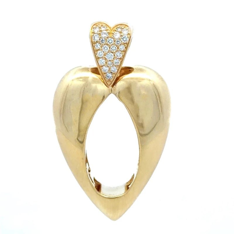 Piaget Gold Heart Pendant Pave Diamond 18k Yellow Long Shape Open Style: This is a rare, highly collectible vintage 18k yellow gold Coeur (Heart) pendant from the iconic Piaget Hearts Collection with a pavé diamond setting, this vintage pendant features a heart-shaped des