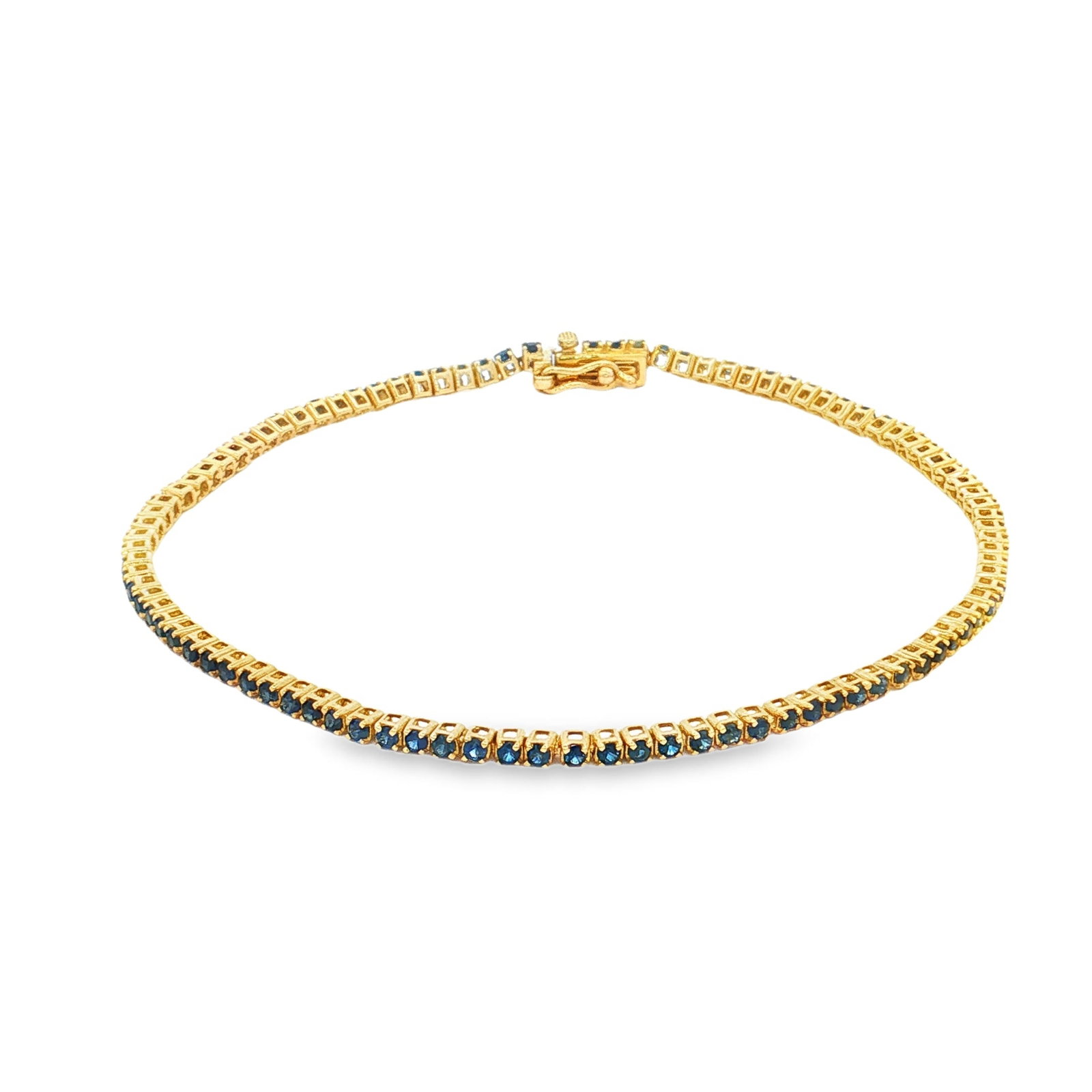 14KT YELLOW GOLD BLUE SEPPHIRE TENNIS BRACELET: 14KT YELLOW GOLD BLUE SEPPHIRE TENNIS BRACELET 14KT GOLD WT. APPROX. 3.71GRAM BLUE SEPPHIRE WT. APPROX. 1.46 CARAT/ 96 PCSLENGTH: 7 INCH LONG