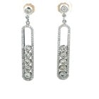 Diamond Gold Dangle Earrings 18k White Long Bar Bezel Set Moving Diamonds: These elegant dangle earrings are crafted from 18k white gold with 14k gold backs, the pair features a bezel set stud top with a long 6mm bar with prong set diamonds around the frame and bezel set mov