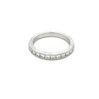 Tiffany & Co. Diamond Wedding Band Platinum Half Circle Channel Set Style: This elegant diamond wedding band is a stunning platinum ring featuring half circle channel set natural white round cut diamonds. The band is signed by the iconic Tiffany & Co. brand and is of very go