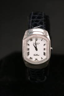 ROLEX CELLINI LADIES WATCH: Rolex Cellini Watches. Ladies size, 18K white gold case set with 144 diamonds, quartz movement, white dial, genuine crocodile strap with 18K white gold deployable clasp.