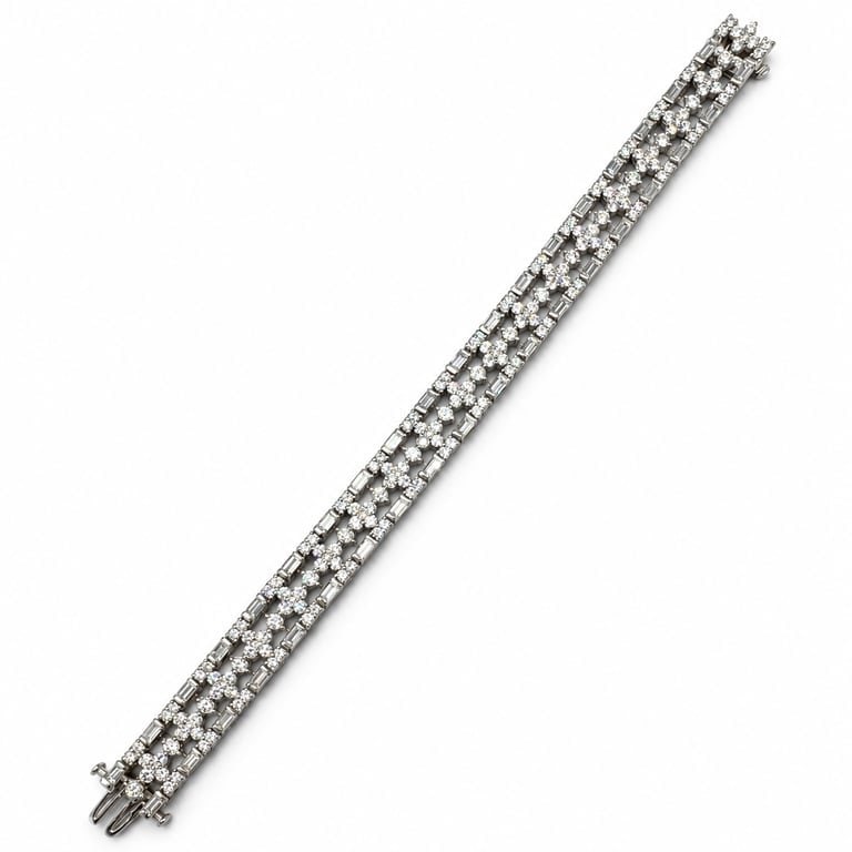 BIRKS Platinum 11.30 Ct. Diamond Bracelet: BIRKS Platinum 11.30 Ct. Diamond Bracelet Weighing 40.3 grams Set with 38 Baguette Diamonds weighing app. 4.50 Ct. Along with 190 Round Diamonds weighing app. 6.80 Ct. F-G Color, VVS-VS Clarity 7.25 i