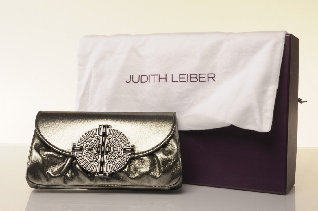 JUDITH LEIBER METALLIC GREY NANCY CLUTCH: JUDITH LEIBER METALLIC GREY NANCY CLUTCH Bag Height: 5.25" Bag Depth: 2.5" Material: SATIN, CRYTAL Bag Length: 9" Strap Drop: 18" Shade: GREY METALLIC METALLIC BLACK, TONAL SQUARE-CUT AUSTRIAN CRYSTAL