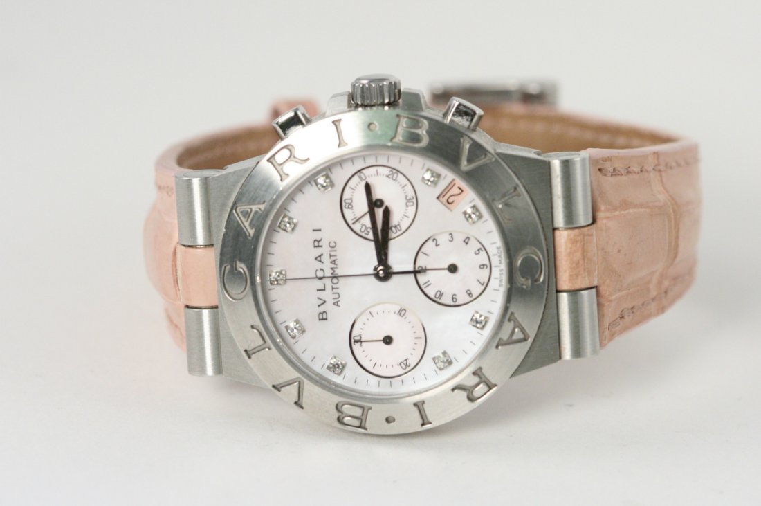 BVLGARI WATCH WITH PINK LEATHER STRAP: BVLGARI AUTOMATIC WITH GORGEOUS PEARL FACE, DIAMOND DIAL, PINK LEATHER STRAP AND DATE. MADE IN SWISS