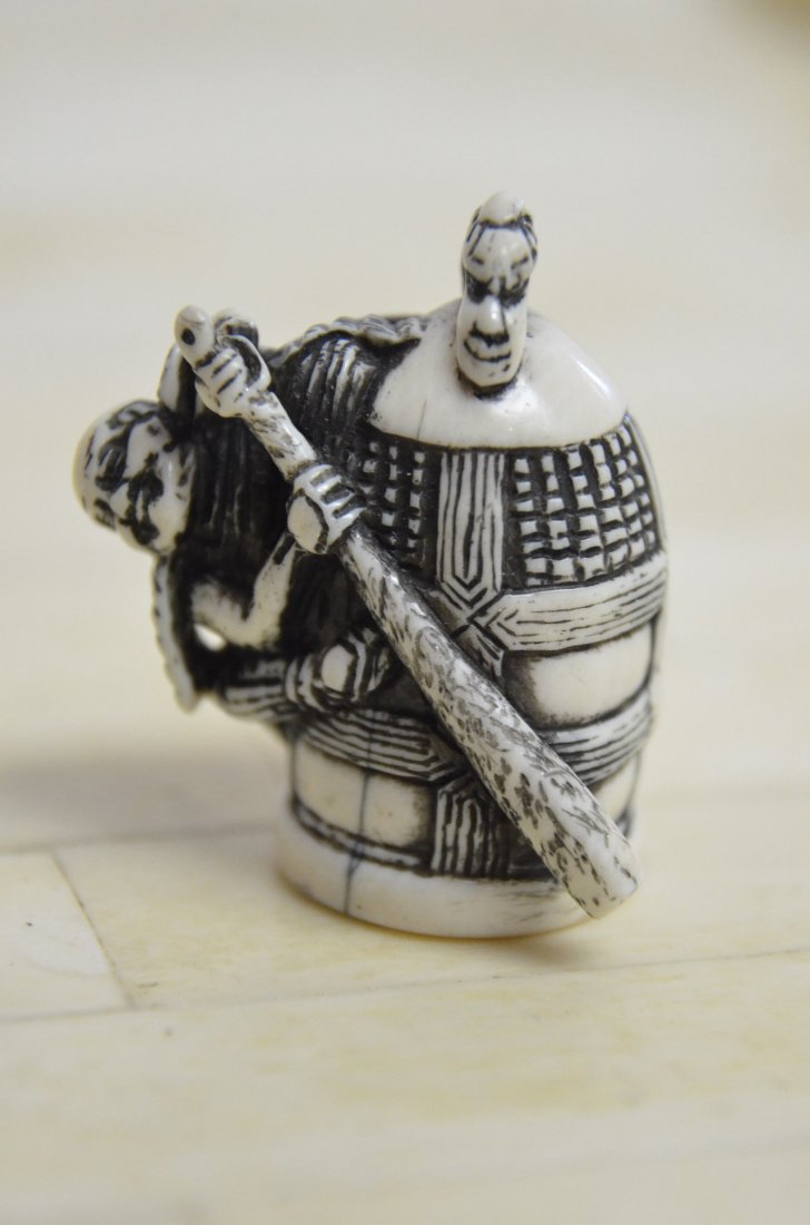 Ivory netsuke-Man on bell: Ivory netsuke-Man on bell VALUE $600