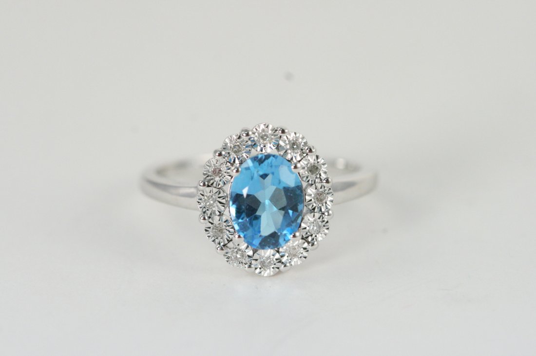 14K W/G DIAMOND AND BLUE TOPAZ RING: 14K W/G DIAMOND AND BLUE TOPAZ RING 1.48 CTS TOTAL DIAMONDS AND BLUE TOPAZ VALUE $1450