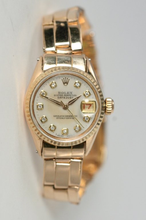 Ladies Rolex gold and diamond watch: STUNNING ROLEX, LADIES ROSE GOLD WATCHLADIES ROSE GOLD ROLEX WATCH WITH CUSTOM AFTER MARKET DIAMOND DIALGREAT