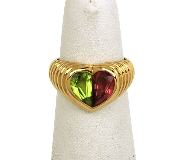 DESIGNER BVLGARI18K YELLOW GOLD & COLORED TOURMALINE: This is a designer Bvlgari 18k yellow gold and colored tourmaline gems ladies heart top band ring. The piece is well crafted in solid 18k yellow gold with a smooth high polished finish adorned with a