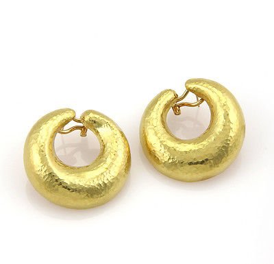 Tiffany& Co. Paloma Picasso 18K Yellow Gold Circular: These authentic Tiffany & Co. earrings are finely crafted from solid 18k yellow gold. They feature a fabulous hammered design. They are fully signed with T&Co, Paloma Picasso, the gold content, and 19