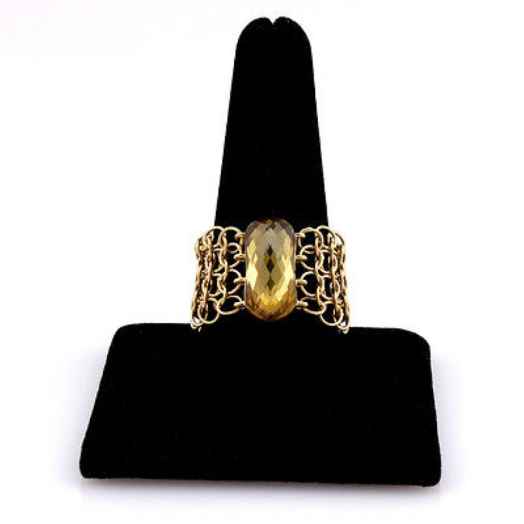 H.Stern 18K Yellow Gold 8ct Smoky Topaz Designer Mesh: This authentic H. Stern piece is finely crafted from solid 18k yellow gold. It features a 8ct smoky topaz and a unique mesh design which looks gorgeous. It is fully signed with Sterns hallmarks and th