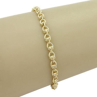 Authentic 18K Yellow Gold Bvlgari Bulgari Fancy Chain: This authentic Bvlgari bracelet is crafted from solid 18k yellow gold. It features a great looking link design thats perfect for just about any occasion. It is stamped on the clasp with Bulgari and th