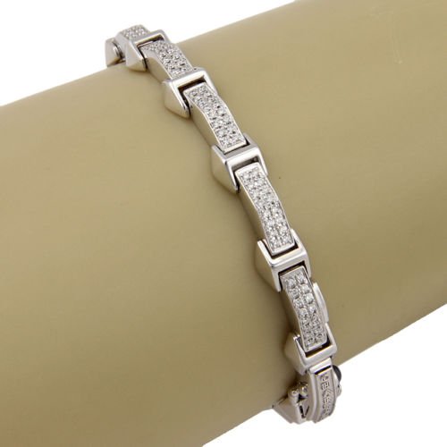 Philippe Charriol 18K White Gold Diamond Link Designer: This authentic Philippe Charriol piece is finely crafted from solid 18k white gold. It features 1ctw of sparkling diamonds set into a unique link bracelet which looks fabulous on the wrist. It is full