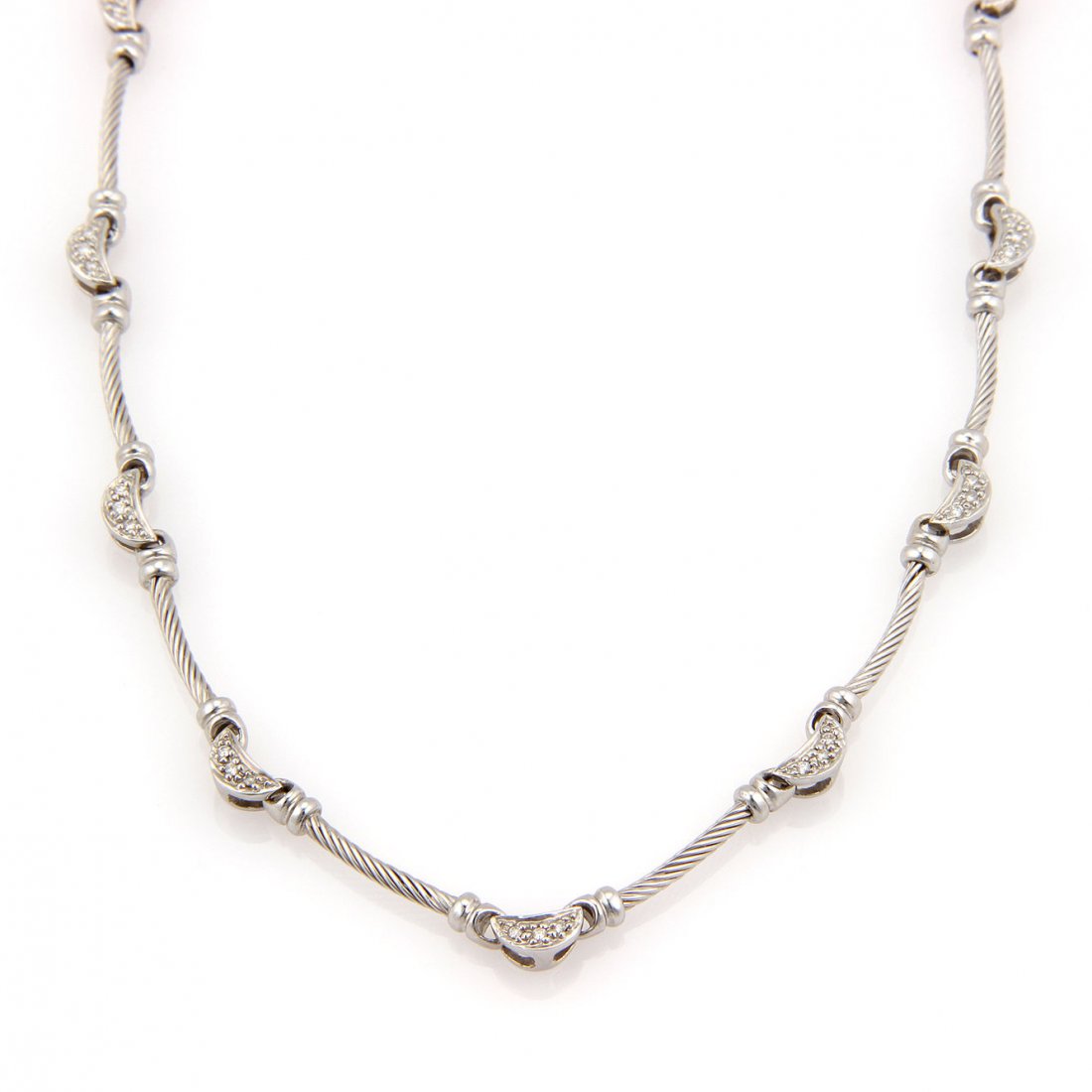 Philippe Charriol 18K White Gold Diamond Moon and Cable: This authentic Philippe Charriol piece is finely crafted from solid 18k white gold. It features little diamond moon shaped links along with cable bars which look absolutely beautiful when worn. It is