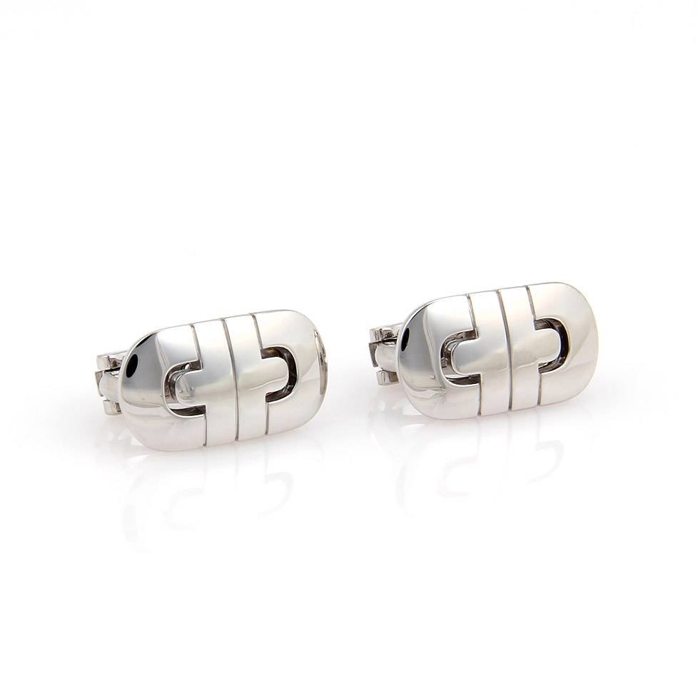Bvlgari Bulgari 18K White Gold Parentesi Earrings: These authentic Bvlgari earrings are finely crafted from solid 18k white gold. They come from Bvlgari's ever so popular Parentesi collection and feature a very smooth high polished finsh showing off t