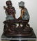 BRONZE MAN & WOMAN SITTING ON MARBLE BASE - 3