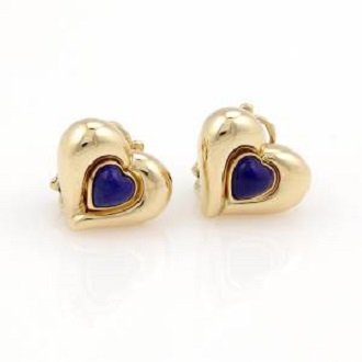 Van Cleef & Arpels VCA 18K Yellow Gold Lapis Heart: These authentic Van Cleef & Arpels heart earrings are finely crafted from solid 18k yellow gold. They feature a beautiful heart shaped design along with heart shape lapis gemstones which look truly go