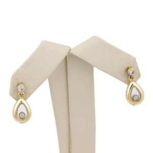 Chopard Happy Diamonds 18K Yellow Gold Teardrop: These stunning Chopard earrings are finely crafted from solid 18k yellow gold. They come from Chopard's ever so popular Happy Diamonds collection. They feature a single diamond at the top which connec