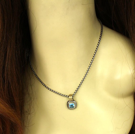 DESIGNER DAVID YURMAN SILVER 14K TOPAZ PENDANT NECKLACE: This is a designer David Yurman sterling silver, 14k gold and blue topaz ladies pendant enhancer necklace. The piece is well crafted in solid sterling silver with a smooth polished finish adorned with
