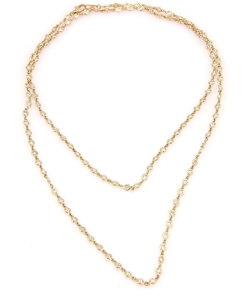 14K Yellow Gold 4.15ct Diamonds By The Yard Eternity: This gorgeous necklace is finely crafted from solid 14k yellow gold. It features 4.15ctw of sparkling diamonds which look absolutely stunning on the neck. The gold content is stamped on the clasp. It 