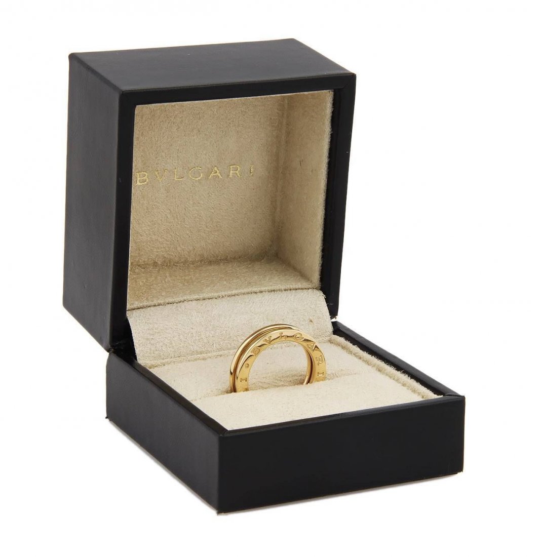 Bvlgari Bulgari 18K Yellow Gold B.Zero1 5mm Band Ring -: This authentic Bvlgari piece is finely crafted from solid 18k yellow gold. It comes from Bvlgari's ever so popular B.Zero1 collection and features their beautiful sigle band design. It is fully signed