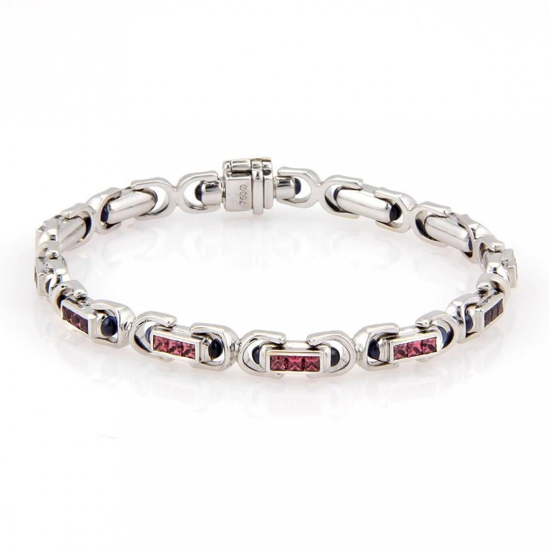 Philipe Charriol 18k W/Gold Pink Princess Cut, Blue: We present for your pleasure a gorgeous bracelet by renowned designer Philipe Charriol, this bold and beautiful bracelet is crafted in solid 18kt white gold and has princess cut pink Sapphire and Cabo
