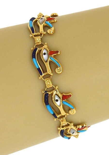 VINTAGE 18K, TURQUOISE, RED CORAL, MOTHER OF PEARL &: This is a vintage 18k gold, turquoise, mother of pearl, blue lapis and red coral gems "eye of ra" ladies bracelet. The piece is well crafted in solid 18k yellow gold with a smooth high polished finish