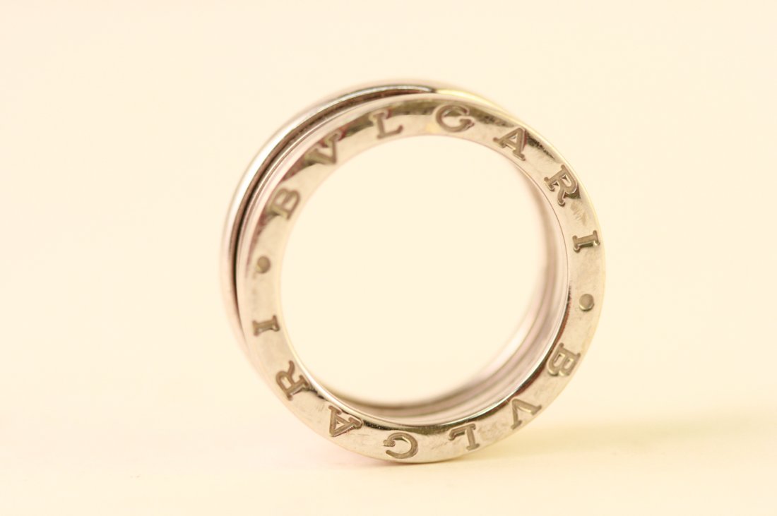 W/G Bvlgari ring: One Bvlgari ring , white gold , double band design. This ring has some scratches on it but is otherwise in good condition. Size 9