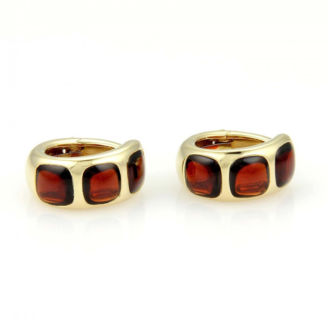 Pomellato 18k Yellow Gold & 9ctw Garnet Clip On Hoop: These lovely pair of earrings are from Pomellato, it is well crafted in solid 18kt yellow gold with a high polished finish and is in a rounded oval hoop style with a hinged clip back style non pierced