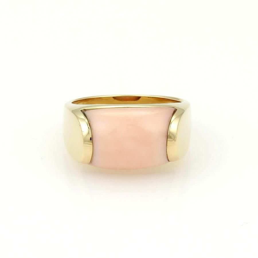 Bulgari Bvlgari 18k Yellow Gold & Coral Tronchetto: A gorgeous ring by Bulgari from the "Tronchetto" collection. It is well crafted in solid 18k yellow gold with high polished finish. The coral is in a rounded block shape with a smooth polished surface