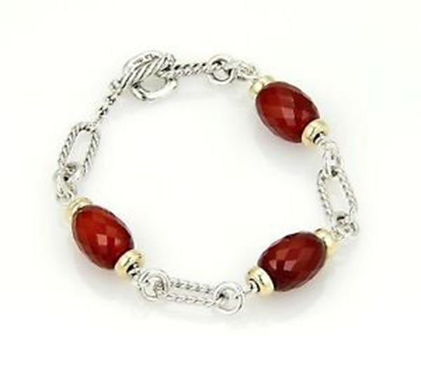 David Yurman 925 Silver 18k Yellow Gold & Carnelian: This is a gorgeous bracelet by David Yurman. It is well crafted from solid sterling silver and 18k yellow gold with a fine polished finish. This amazing bracelet boast three broilette cut oval shape c