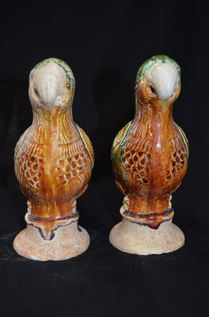 pair of bird candle holder: Tang dynasty, candle holder , depicting a bird,"private collection of a senior citizen from Ohio, seller gaurantees that it is not a reproduct,with him for more than 20 years