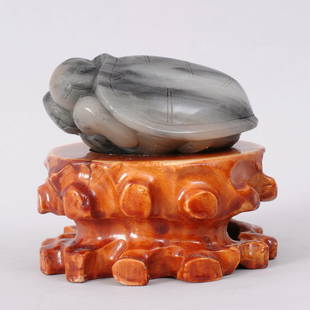 1082: VERY FINE CHINESE QING CARVED JADE TURTLE: VERY FINE HETIAN QINGHUA ZI JADE CARVED TO DEPICT FAINT HEARTED TURTLE ON WOODEN STAND, QING, SIGNED QIANLONG