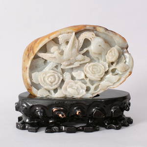 1086: A FINE CHINESE CARVED HETIAN JADE BOULDER