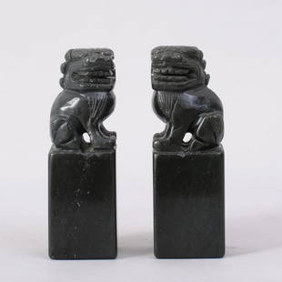 1102: PAIR OF CHINESE CARVED HETIAN JADE FOO DOG SEALS: HETIAN GREEN JADE CARVED FOO DOG SEALS