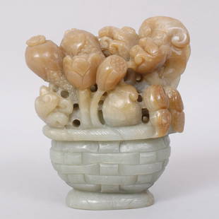 1115: A FINE CHIENSE CARVED HETIAN JADE SCULPTURE: FINE HETIAN JADE CARVED TO DEPICT MANY FLOWERS IN A POT