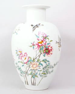 1124: FINE CHINESE FAMILLE ROSE PORCELAIN VASE: BEAUTIFUL VASE FINELY PAINTED WITH BIRDS FLYING AMONG BLOOMING FLOWERS AND BAMBOOS. 17"H,9.5"W. SEAL MARK FOR YONGZHENG PRODUCTION ON BOTTOM. PRIVATE COLLECTION ROCHESTER HILLS,MICHIGAN.