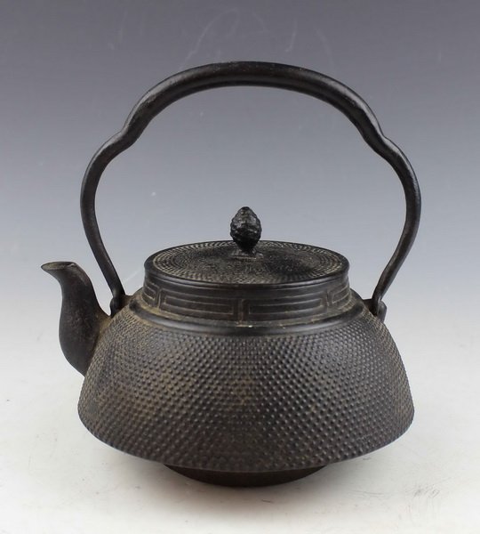 Antique Japanese Iron Cast Teapot: Measurements: H: 8.25",W: 7.5",D: 6.5".