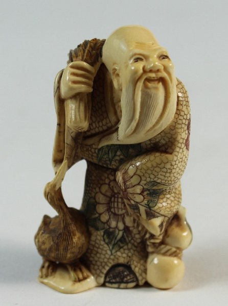 JAPANESE ANTIQUE 19TH C CARVED NETSUKE: H:6cm,W:3.5cm,D:2cm.