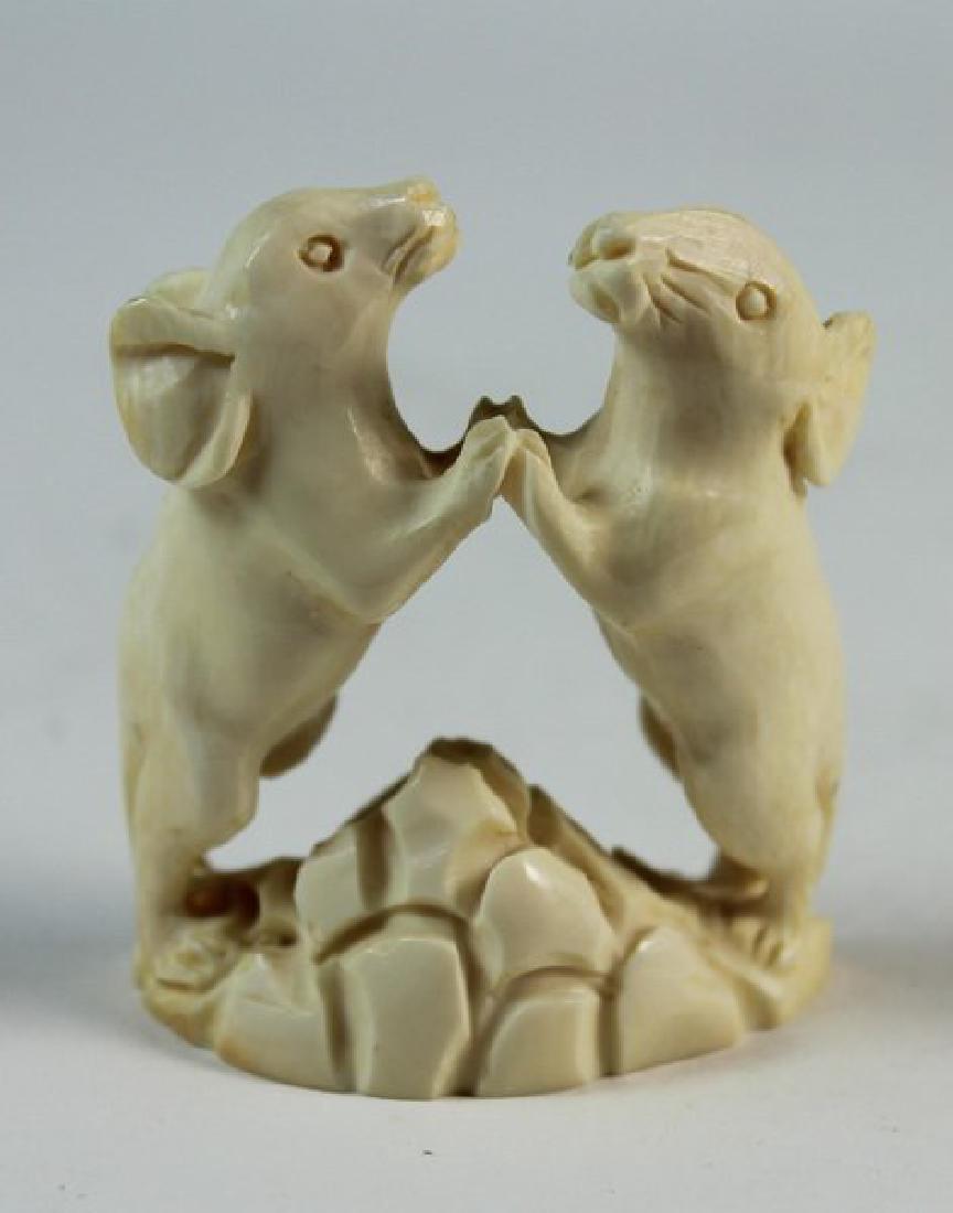 JAPANESE ANTIQUE 19TH C CARVED NETSUKE: H:5cm,W:4cm,D:2.5cm.