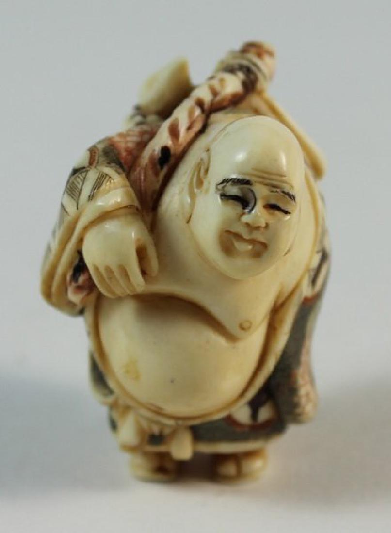 JAPANESE ANTIQUE 19TH C CARVED NETSUKE: H:4cm,W:2.5cm,D:3cm.