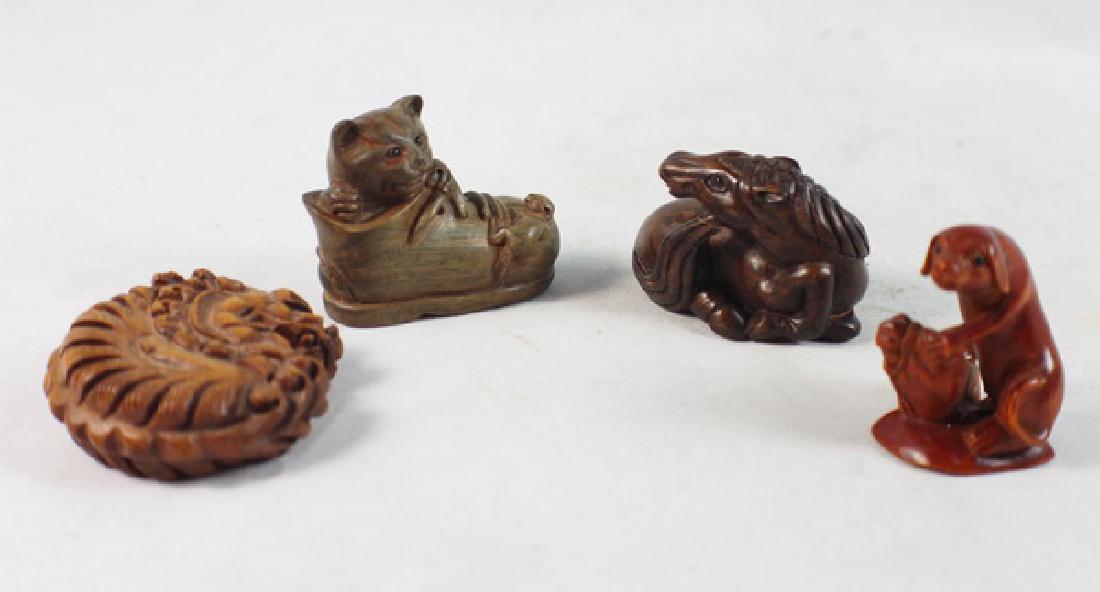 GROUP OF 4 JAPANESE ANTIQUE 19TH C CARVED NETSUKES: Cat H:4cm,W:4.5cm,D:2.5cm.