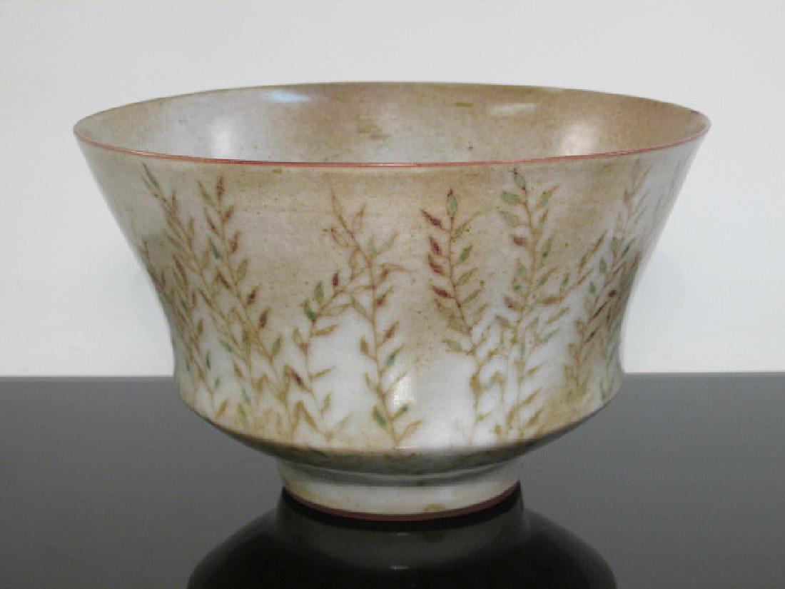 VINTAGE FRANCINE DEL PIERRE GLAZED POTTERY BOWL: Vintage glazed pottery bowl by Francine Del Pierre. Measures a total of 6.25" tall x 10.25" in diameter. Decorated with a leaf design in the glaze along the outer edge. Marked with a single small circ