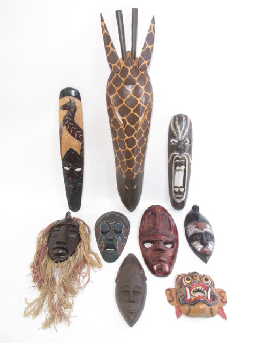 NINE ASSORTED CARVED WOOD & OTHER TRIBAL MASKS (1 of 10)