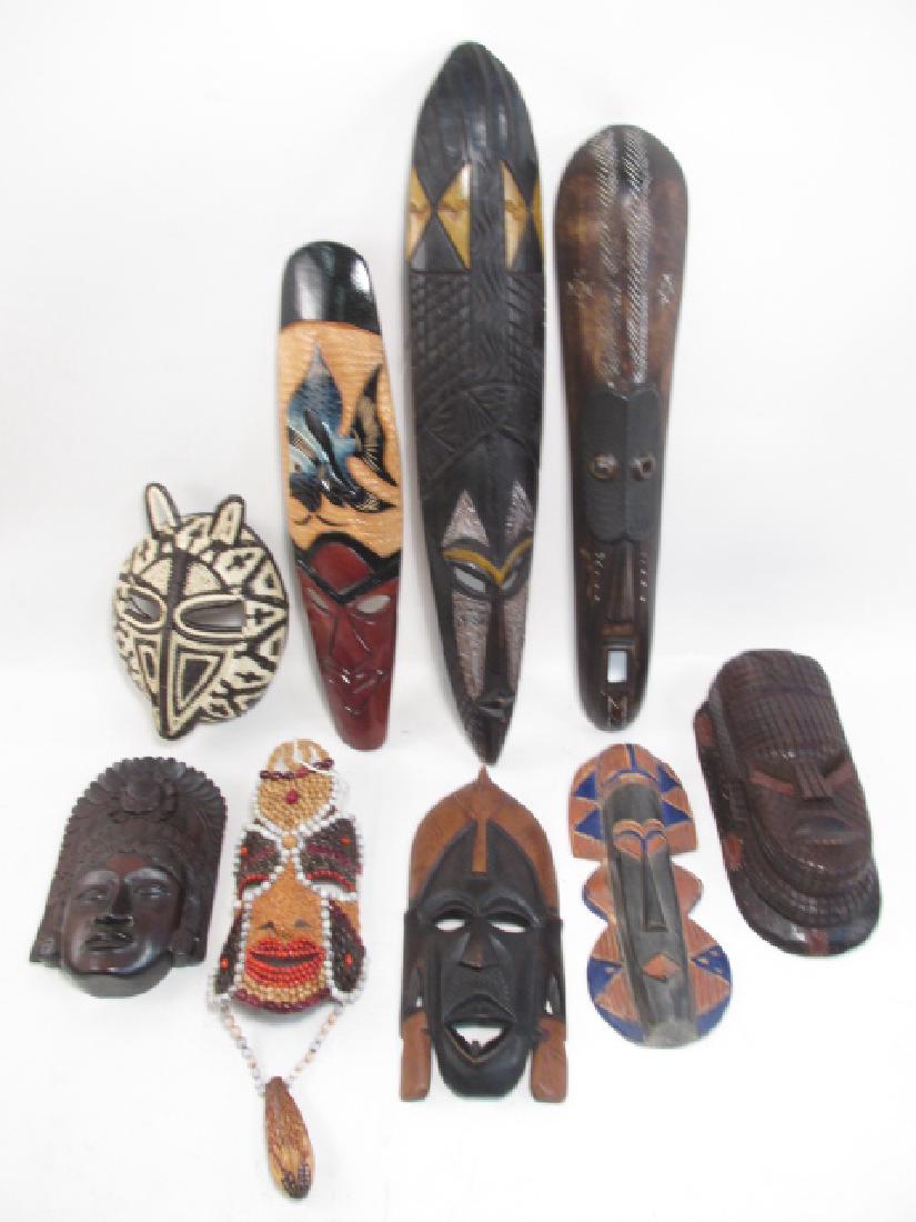 NINE ASSORTED CARVED WOOD & OTHER TRIBAL MASKS (1 of 9)