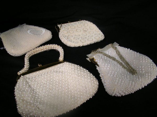 4 ASST VINTAGE BEADED CORDE BEAD EVENING BAGS: Lot # 2: 4 ASST VINTAGE BEADED CORDE BEAD EVENING BAGS - Ivory with metallic thread with metal frame at 7" tall x 8 1/2" wide, smaller bag with all over pearl bead design at 7 1/2" tall x 7" wide, all