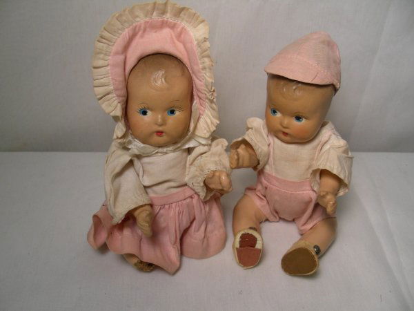 TWO VINTAGE EFFANBEE COMPOSITION BABY DOLLS: Lot # 138: TWO VINTAGE EFFANBEE COMPOSITION BABY DOLLS - Two cute little composition baby dolls with what appears to be the original clothes. Girl doll is missing her lower legs. Boy doll is complete